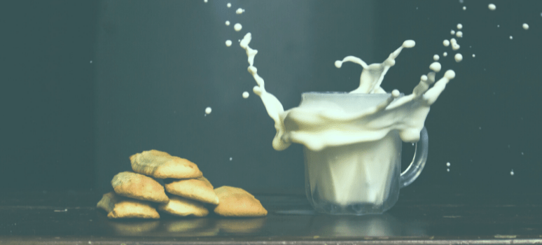 Glass with milk and biscuits